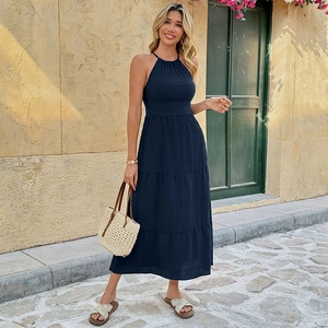Navy blue halter neck tiered maxi dress with high waist and backless summer vacation design