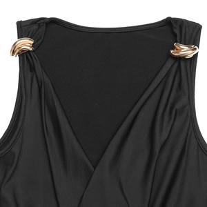 Detail of deep V-neckline with decorative gold wavy metal accents on black sleeveless bodysuit