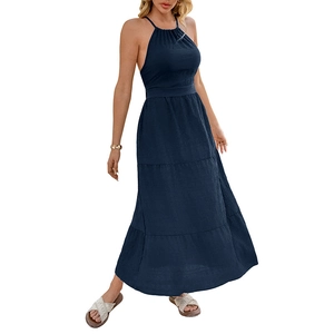 Navy blue halter neck tiered maxi dress with cinched waist and backless summer design