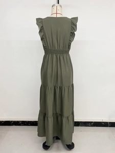 Detail of army green tiered maxi dress with ruffled shoulders and elastic high waist