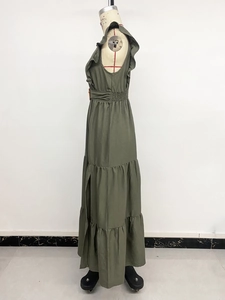 Detail view of olive green tiered maxi dress with ruffle sleeves and elastic high waist
