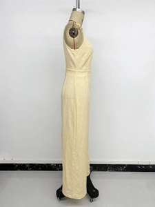 Close-up of elegant sleeveless jumpsuit with fine 3D floral jacquard textured pattern