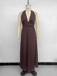 Detail of deep V-neck halter dress with brown and white polka dot pattern on an S-size form