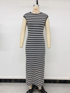 Detailed front view of a striped knitted sleeveless maxi dress on a mannequin