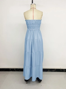 Detail view of light blue strapless tiered maxi dress with ribbed texture and smocked bodice