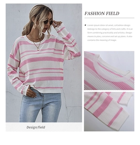Detail view of pink and white striped knit sweater showing neckline and soft texture