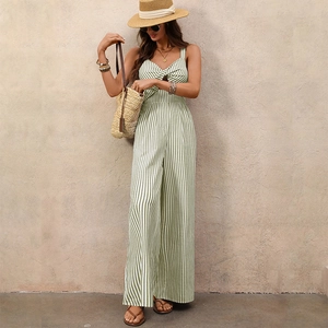 Green and white striped sleeveless wide leg jumpsuit with waist cutout and twist knot detail