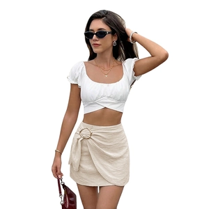 Elegant high waist mini skirt with golden metal ring and side drawstring detail