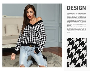 Detail view of V-neck houndstooth knit sweater with zoomed fabric texture and loose fit style