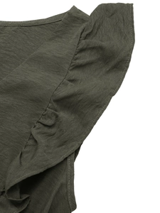 Detail of army green cotton linen dress showing ruffle sleeves and high-quality fabric texture