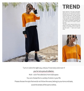 Détail d'un pull en maille color-block avec des motifs orange, blanc et vert foncé