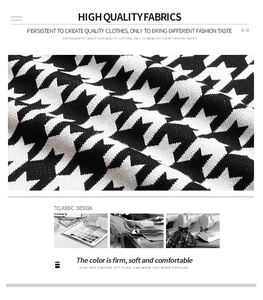 Detailed macro view of black and white houndstooth knitted fabric with soft texture