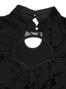 Detail of vintage black mesh top with mandarin collar, frog button and pearl accent