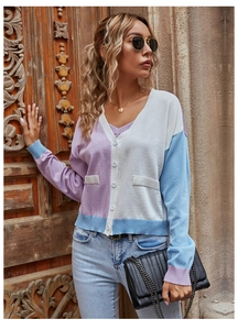 Detailed view of color-block V-neck knit cardigan with purple, white and blue panels