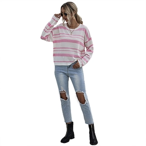 Women's casual striped knit sweater in pink and white with a relaxed drop shoulder fit