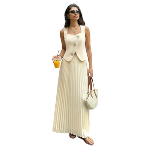 Chic beige two-piece set featuring a sleeveless vest with large buttons and pleated skirt