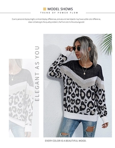 Detail of leopard print patchwork knit sweater featuring ribbed cuffs and hem style