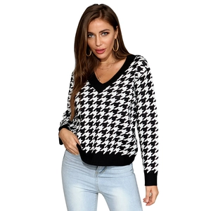 Women's V-neck oversized houndstooth sweater in black and white knit pattern