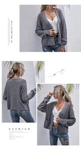 Detaillierte Ansicht der grauen Strickjacke mit V-Ausschnitt, Rippstrick und Seitentaschen