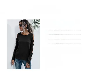 Detailed view of black cold shoulder knit top with hollow strap and ribbed texture
