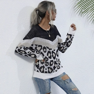 Women's loose knit sweater with black, grey and leopard print color block panels
