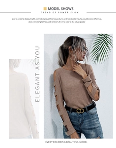 Detail of khaki ribbed knit sweater featuring cold-shoulder cut-outs and sleeve hollow design