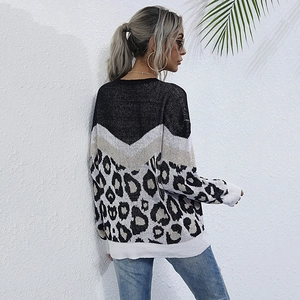 Women's crewneck knit sweater with leopard print and black white color block design