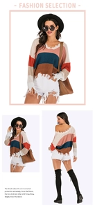 Detail view of multicolored striped knit sweater with distressed hem and frayed edges