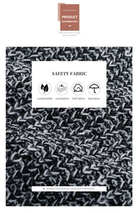 Detailed macro view of black and white blended safety fabric with breathable knit texture