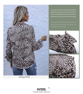 Macro detail of high-quality leopard print fabric and stitching on women shirt