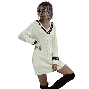 V-neck cream knit sweater dress with contrast stripes and cable knit texture detailing