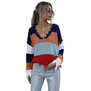 Women's V-neck striped knit sweater with distressed frayed edges and colorful patterns