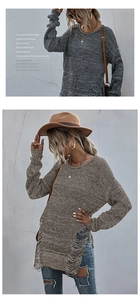 Detail of knit sweater showing loose side tassels and stylish ripped hollow-out design