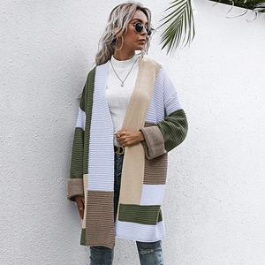 Women's color block knit cardigan featuring vertical stripes and geometric patterns