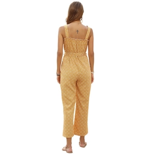 Back view of summer yellow floral jumpsuit with ruffle wide legs and elastic waist