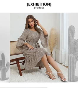 Detailed view of leopard print midi dress with flare sleeves and waist tie detail