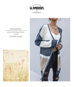 Detail showing soft knit texture and color-block stripe design of the long cardigan