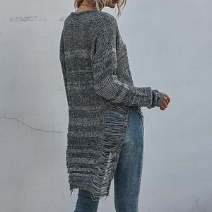 Grey and black distressed knit sweater featuring side ripped details and a longline fit