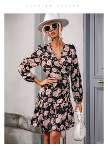 Detailed view of V-neck floral wrap dress with long sleeves and drawstring waist