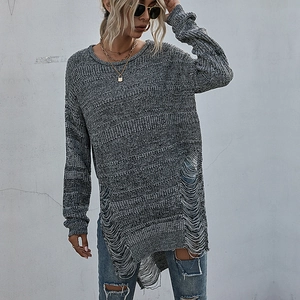Grey chunky knit sweater featuring distressed side cut-outs and a relaxed street style fit