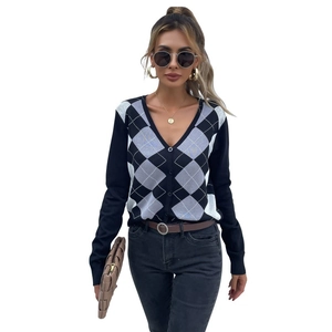 Women's V-neck argyle cardigan sweater with black and white diamond knit pattern
