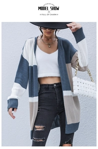 Detail of color-block knit cardigan texture in grey-blue, beige, and khaki tones