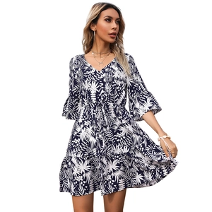 Floral V-neck mini dress with flare sleeves and tropical palm leaf print in navy blue