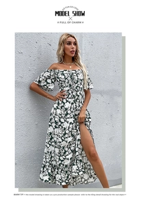 Detail view of floral off-shoulder maxi dress with high slit and ruffled hemline