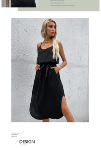 Detailed view of black satin midi dress with waist tie and side slit detail