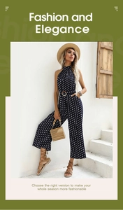 Detail view of high waist polka dot jumpsuit with halter neck and waist belt