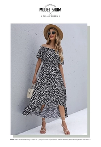 Detail of floral off-shoulder summer dress with buttons and irregular ruffle hemline