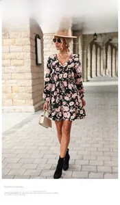 Floral A-line dress featuring a V-neckline and long sleeves with elegant flower prints