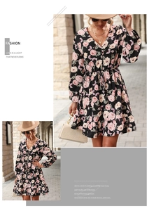 Detail of floral V-neck dress with rose print, ruffles, and chic fashion accessories