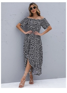 Detail of off-shoulder floral dress with ruffled hem and chic black summer print pattern